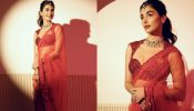 Pooja Hegde masters ‘red radiance’ in see-through Manish Malhotra saree [Photos]