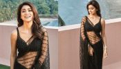 Shriya Saran Exudes Sheer Elegance In Black Saree With Plunging Blouse [Photos] 