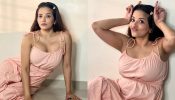 Sultry in pink! Monalisa spells magic in deep neck midi dress