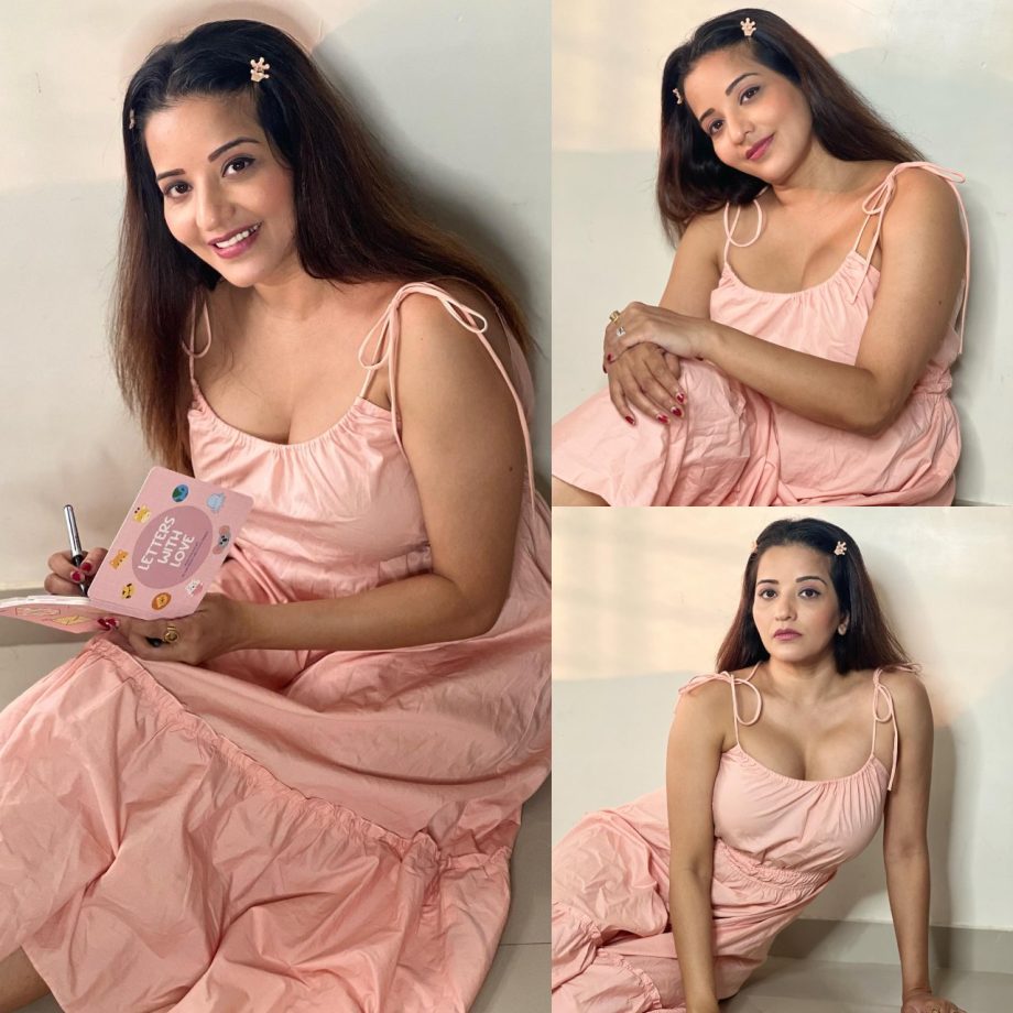 Sultry in pink! Monalisa spells magic in deep neck midi dress 869614