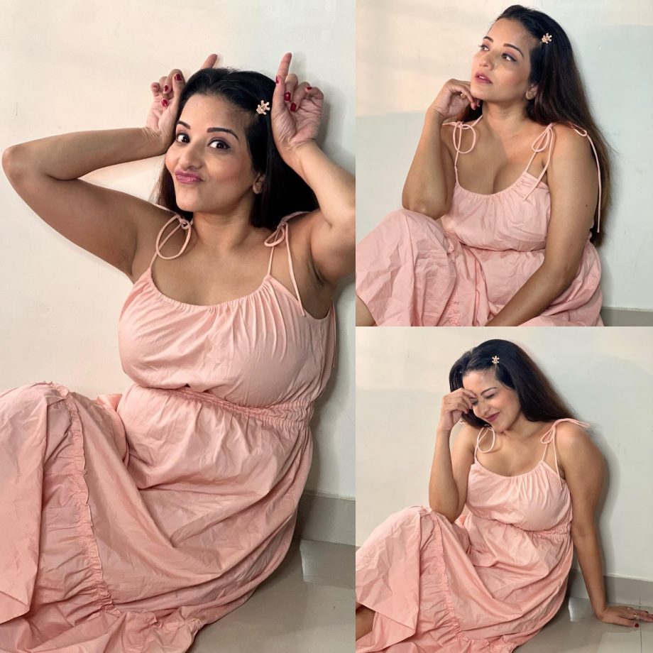 Sultry in pink! Monalisa spells magic in deep neck midi dress 869615