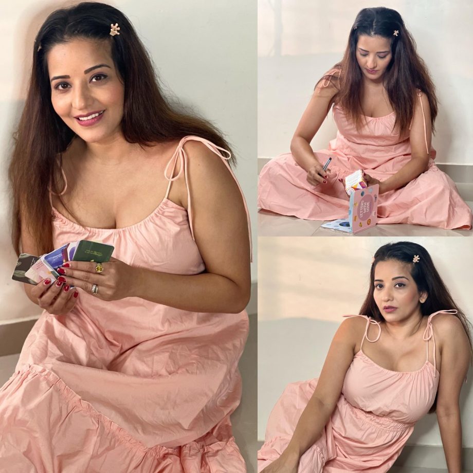 Sultry in pink! Monalisa spells magic in deep neck midi dress 869616