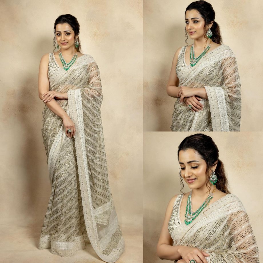 Divine! Trisha Krishnan shines in sequinned ivory see-through saree [Photos] 871689