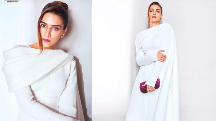 Kriti Sanon Gives Her White Classic Outfit A Pop Spin With Lilac Handbag, See Photos 874474